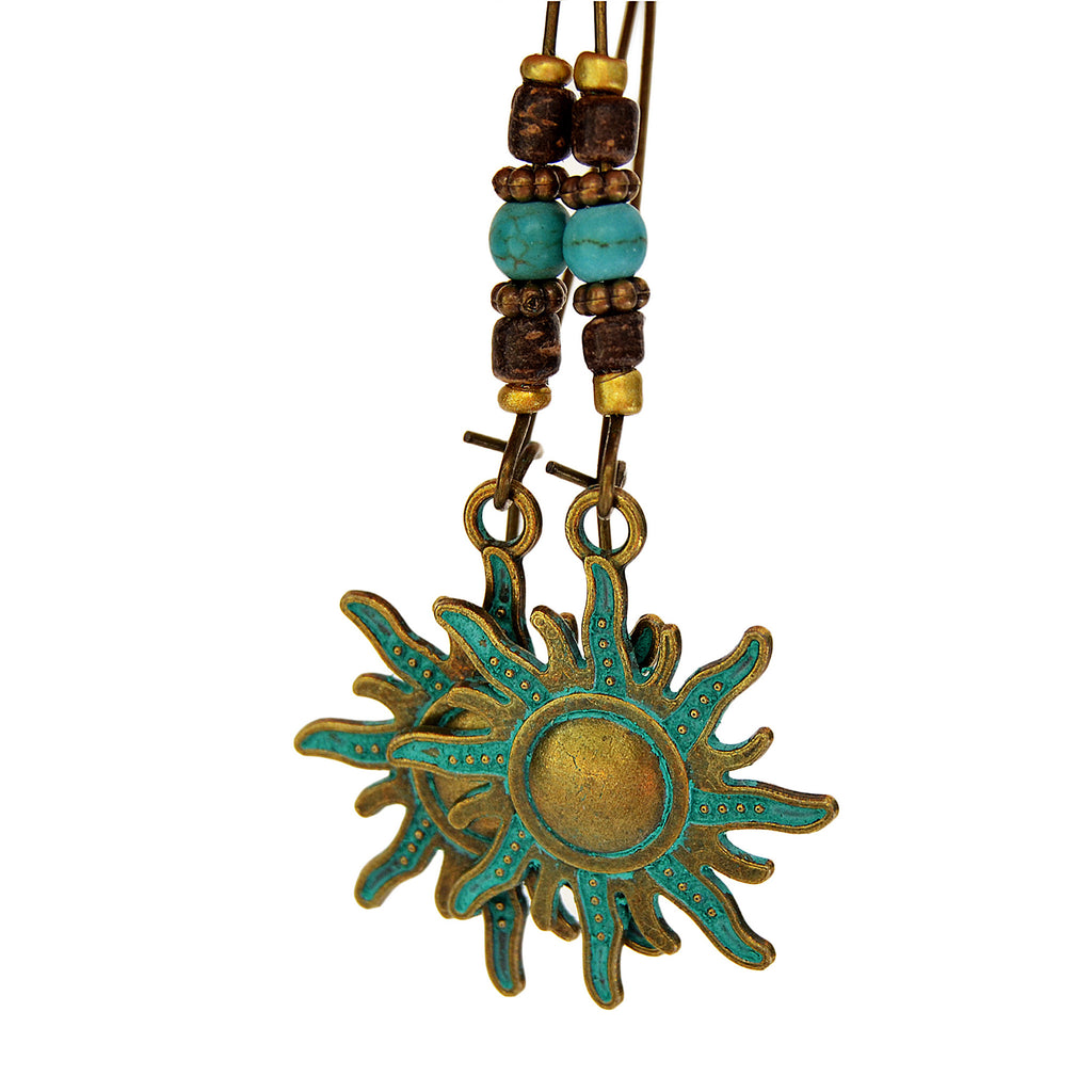 Sun hanging earrings with aged blue patina on brass