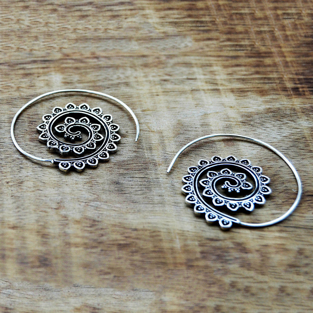 Silver ethnic creole earrings