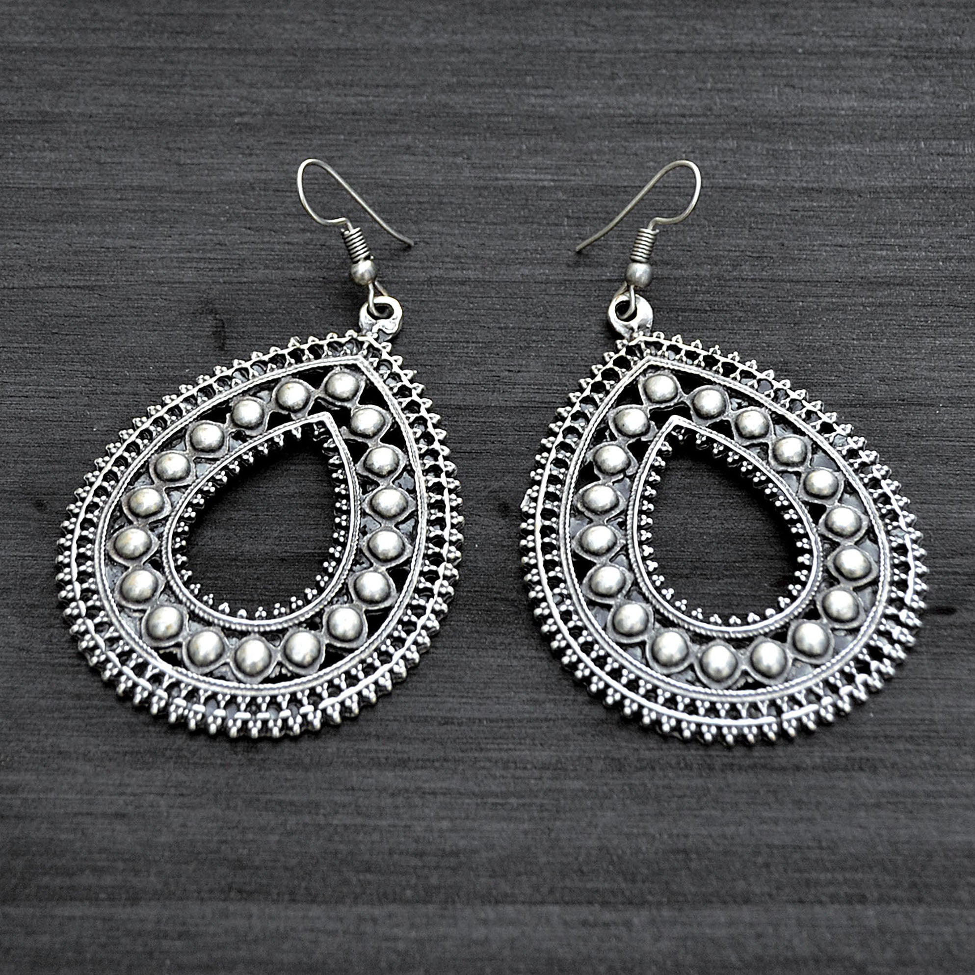 Silver ethnic drop earrings