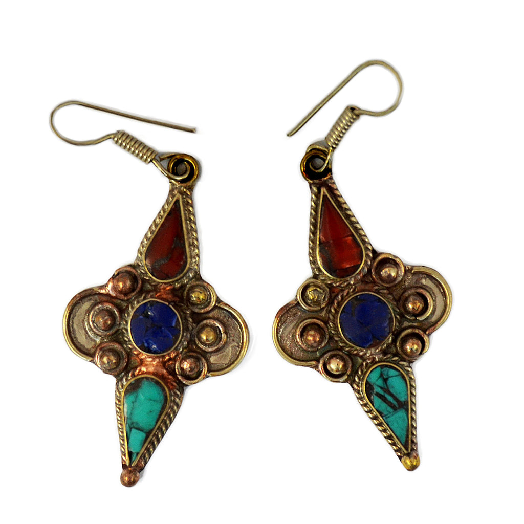 Silver tribal dangle earrings with inlay turquoise, lapis lazuli and red coral stones on white 