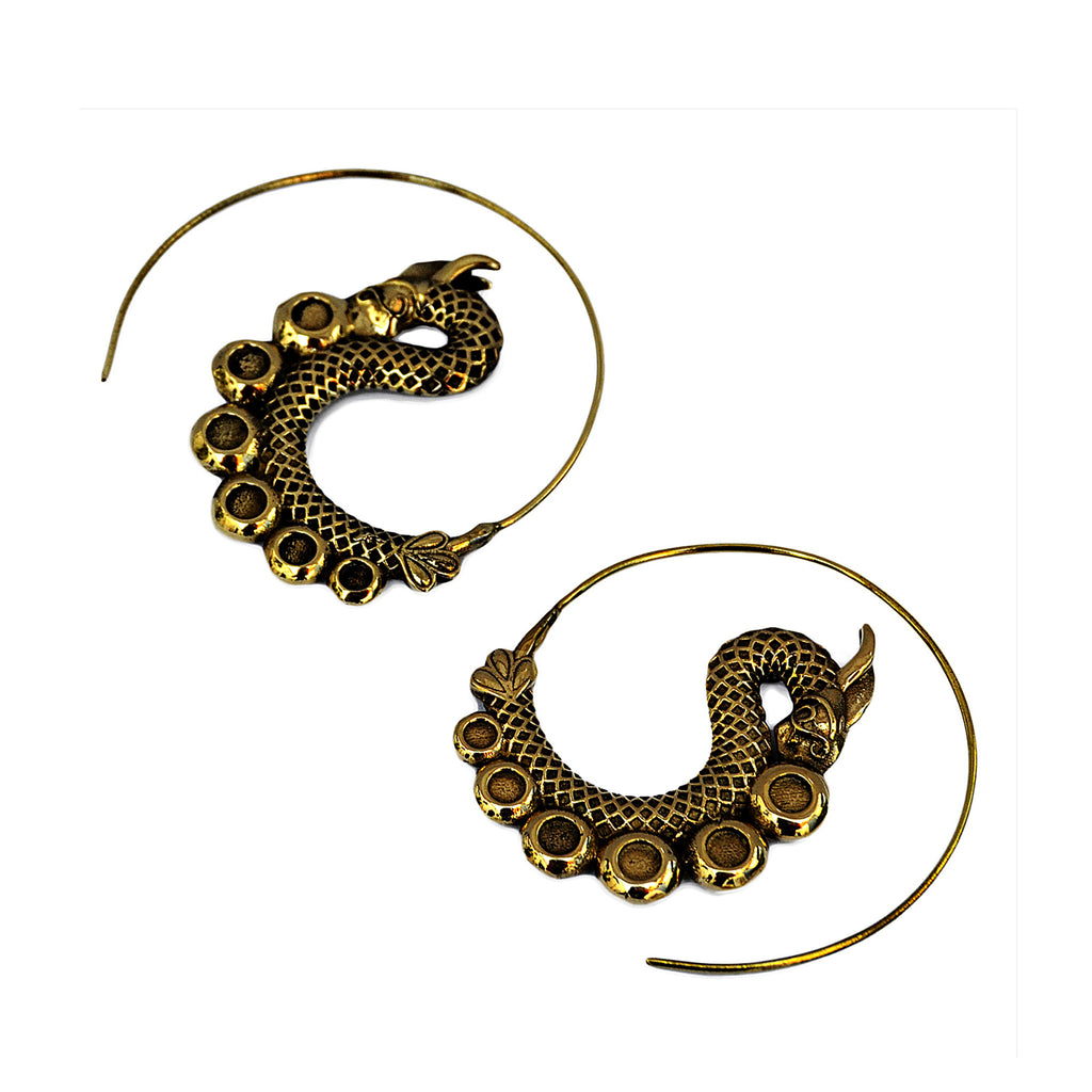 Brass ethnic dragon spiral earrings on white background