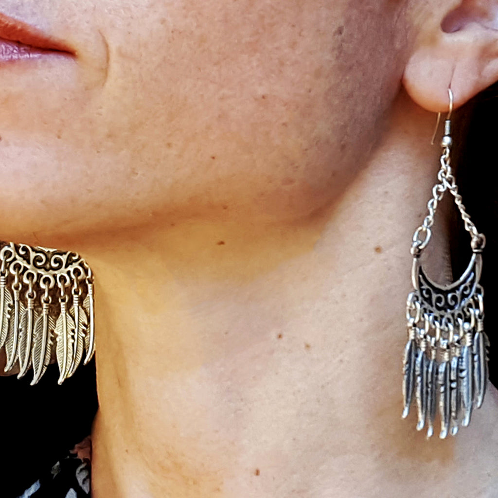 Woman wearing native silver  tribe earrings