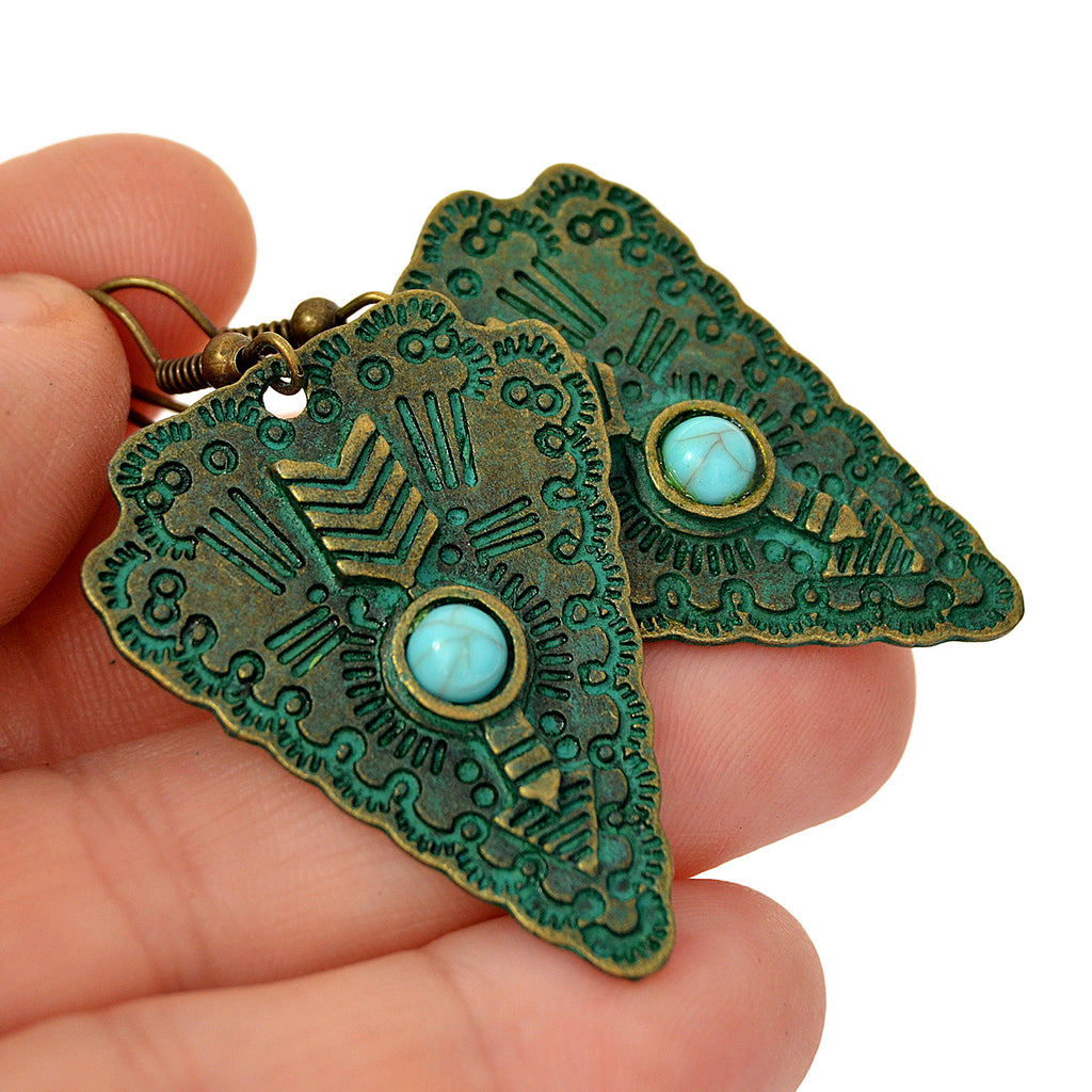 Triangle hook earrings with blue bead, engraved ethnic details and green patina on brass
