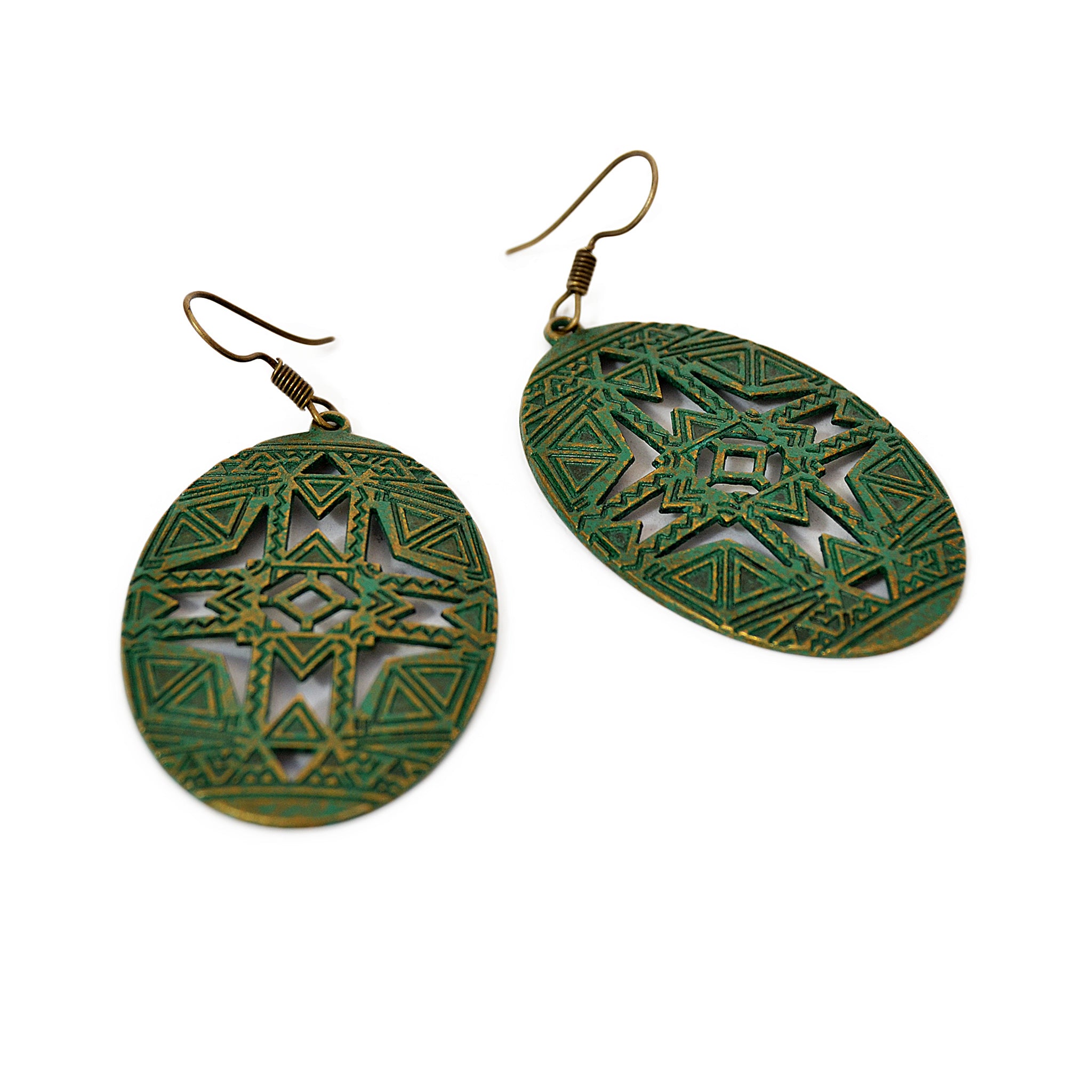 Oval hanging earrings with old turquoise green patina and geometric carved design