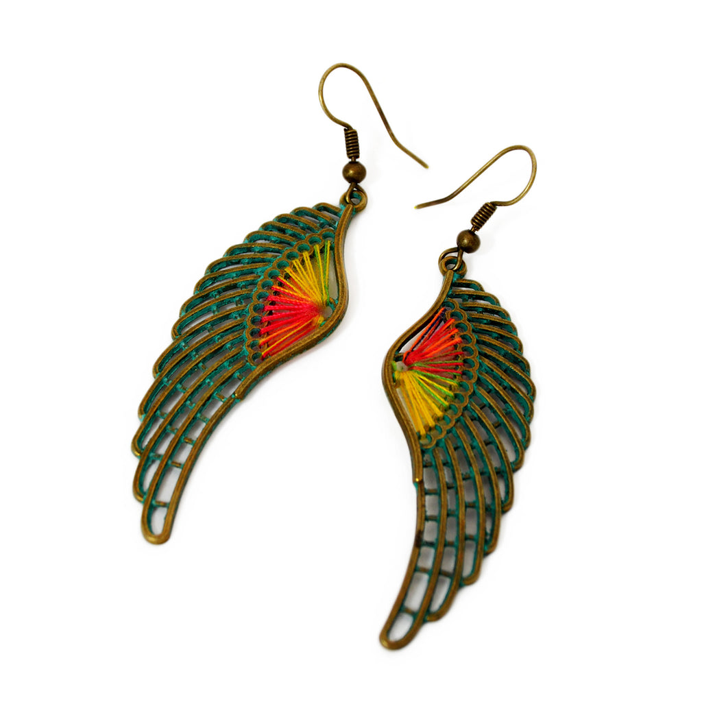 Wing hook earrings with colored threads and green patina on brass