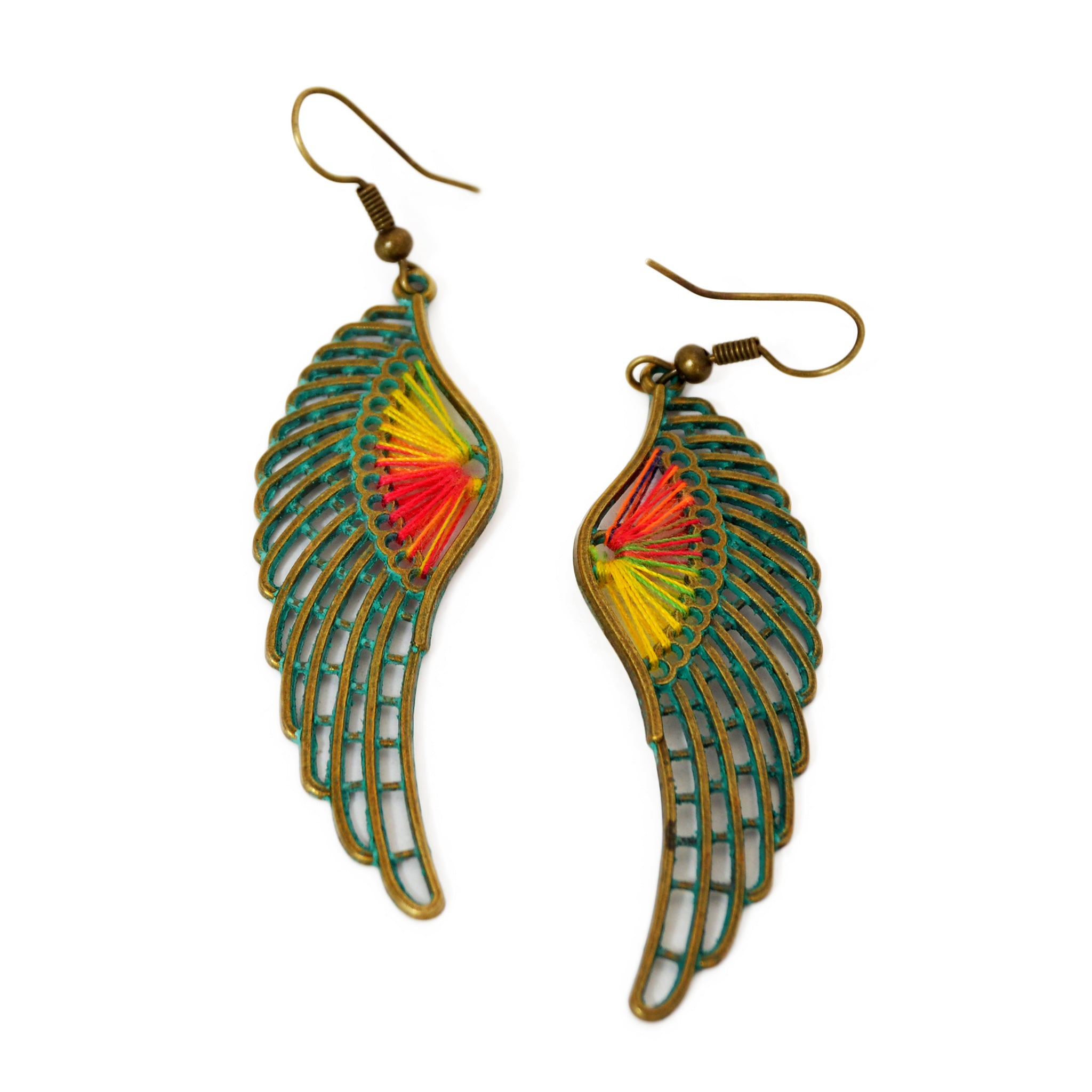 Wing earrings with colored threads and aged green patina on brass