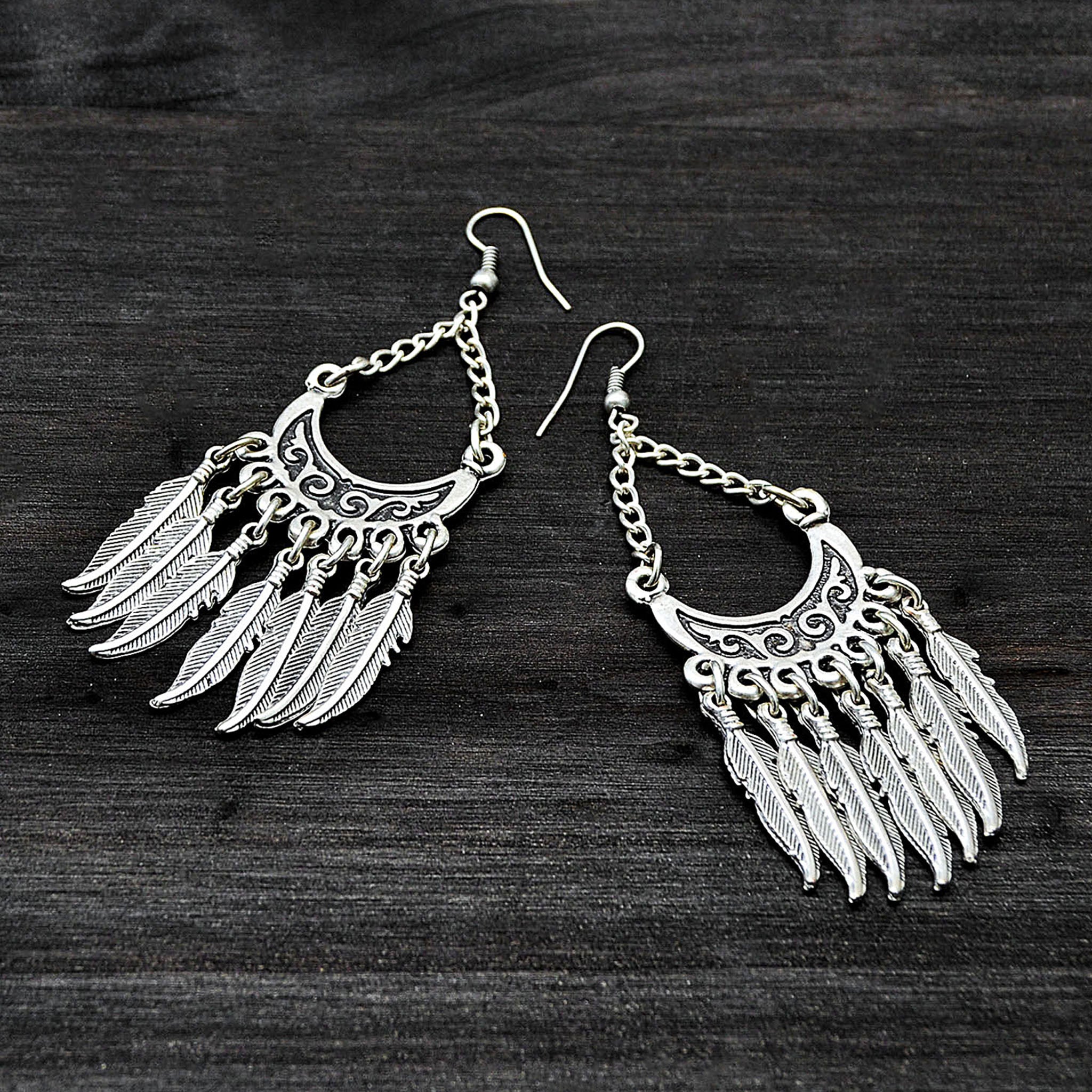 Hill tribe feather earrings in silver color
