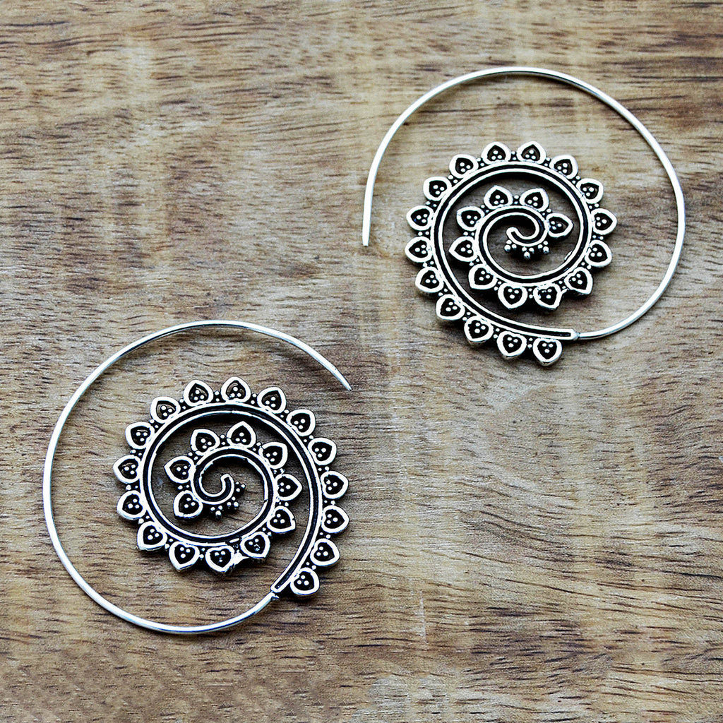 Silver tribal creole earrings