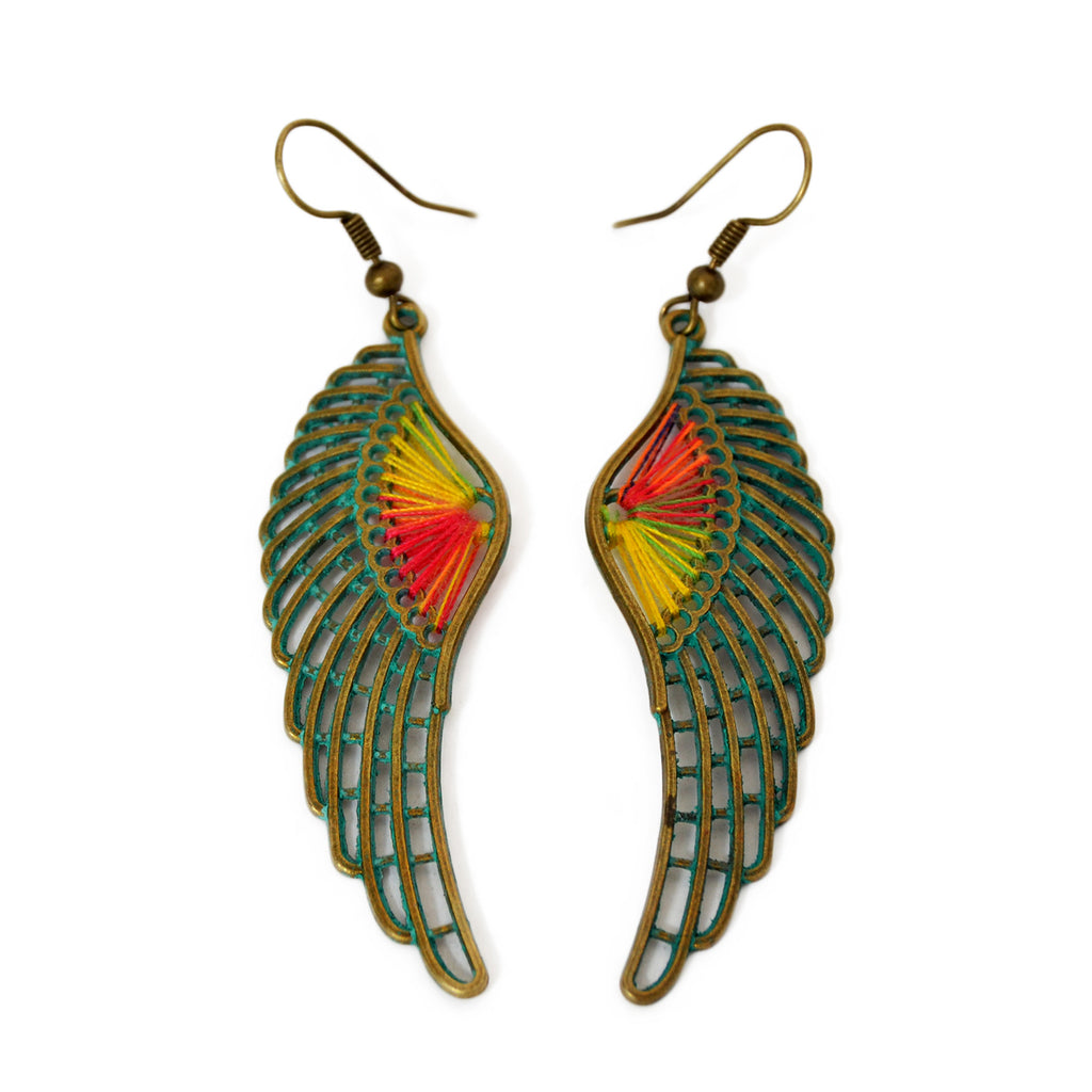 Wing earrings with colored threads and green patina on brass