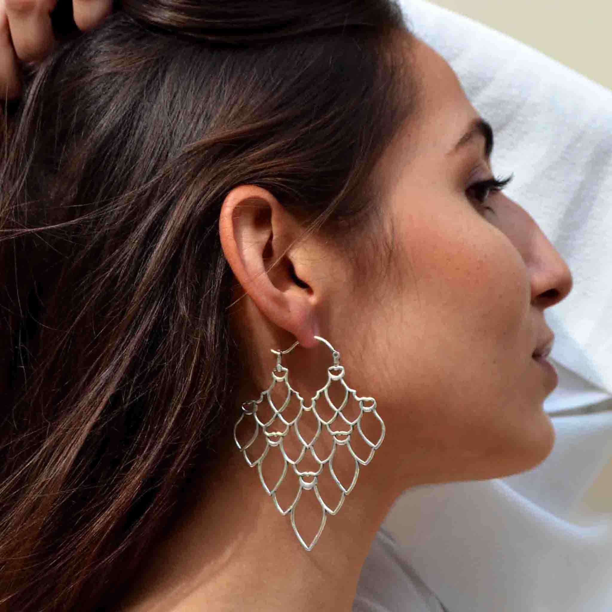 Large filigree store earrings